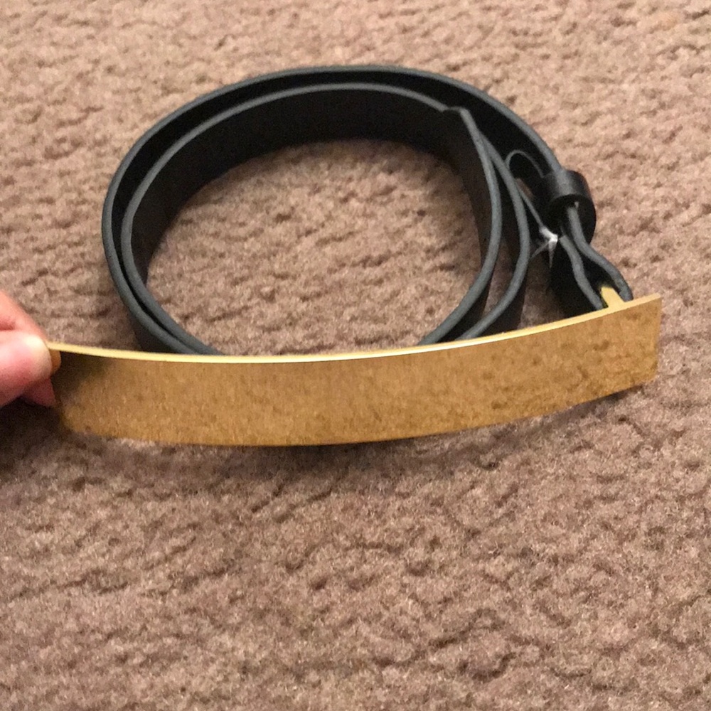 Black belt with gold buckle